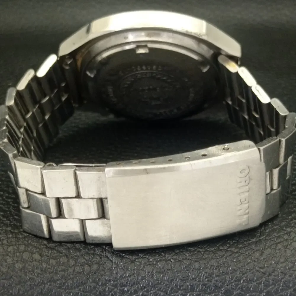 Vintage 1975 Ricoh Automatic Mens Silver Watch W/daydate & Gold accents